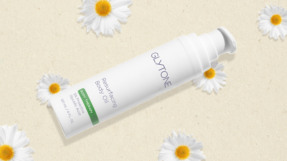 Meet the First Ever Glycolic Body Oil That Shoppers Say Erases Discoloration & Smoothes Arm Bumps Within 2 Weeks