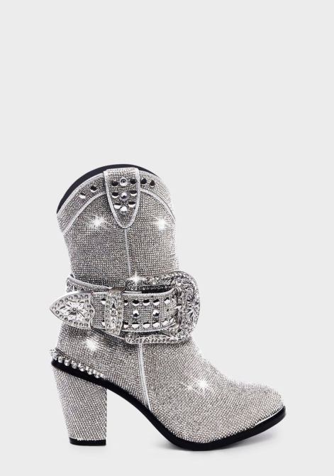 les poupées tuent des bottes de cow-boy brillantes