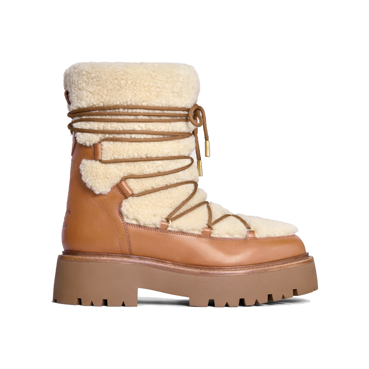 Botte à lacets volumineuse en peau de mouton retournée et en cuir de veau