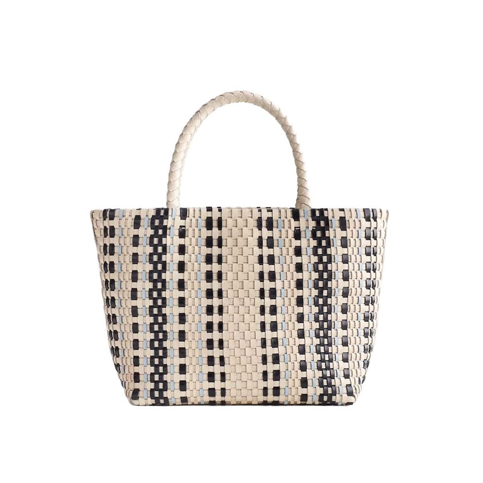 Le mini fourre-tout à la main Le mini fourre-tout à la main