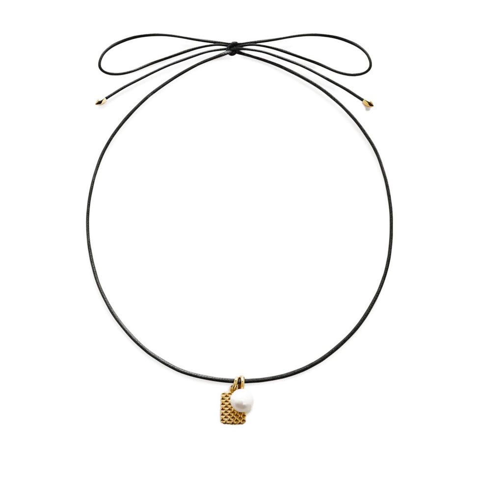 Collier de cordon de perle et de charme 