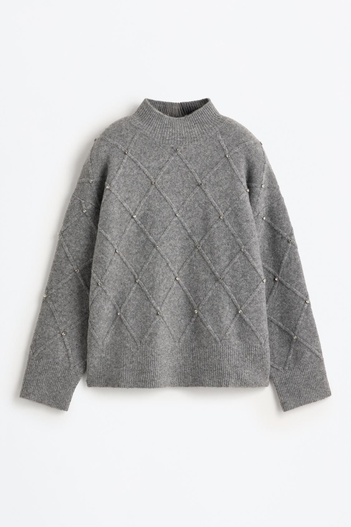 Pull en maille gris avec applications brillantes