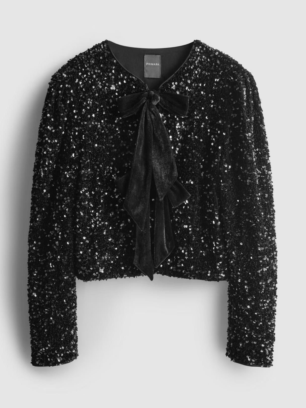 Veste noire à sequins et nœuds