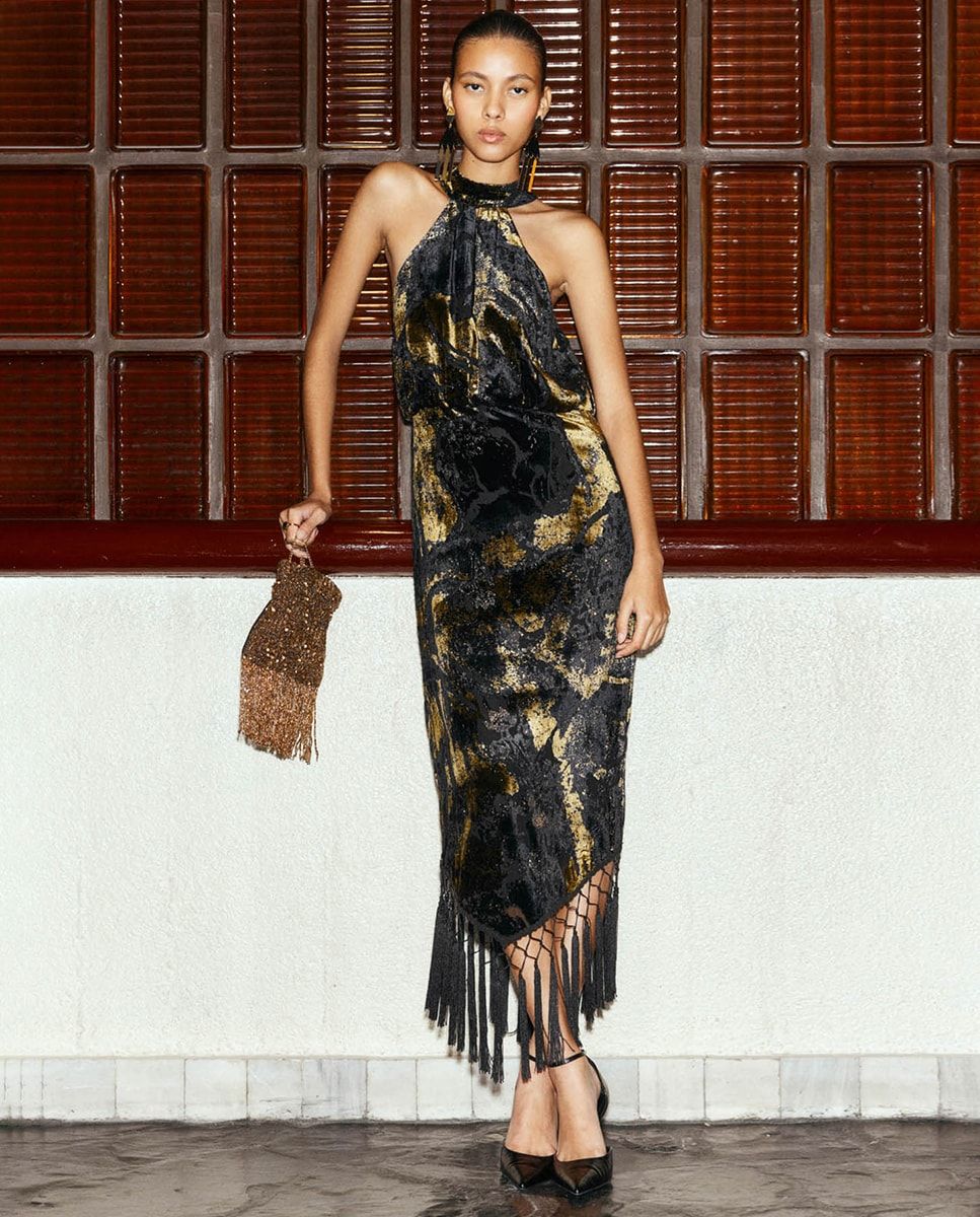 Robe dos nu à franges