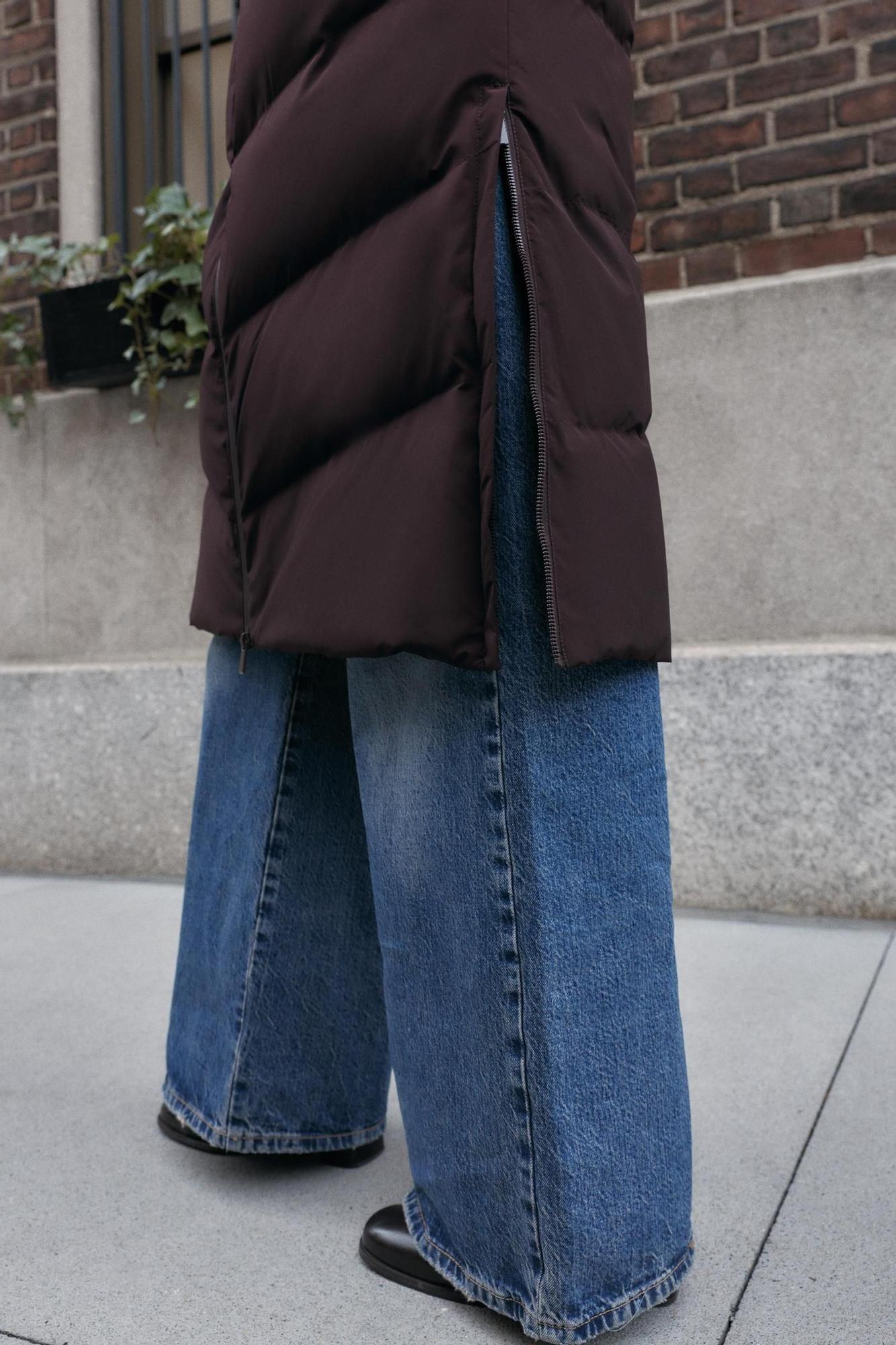 Doudoune avec détail zippé sur le côté