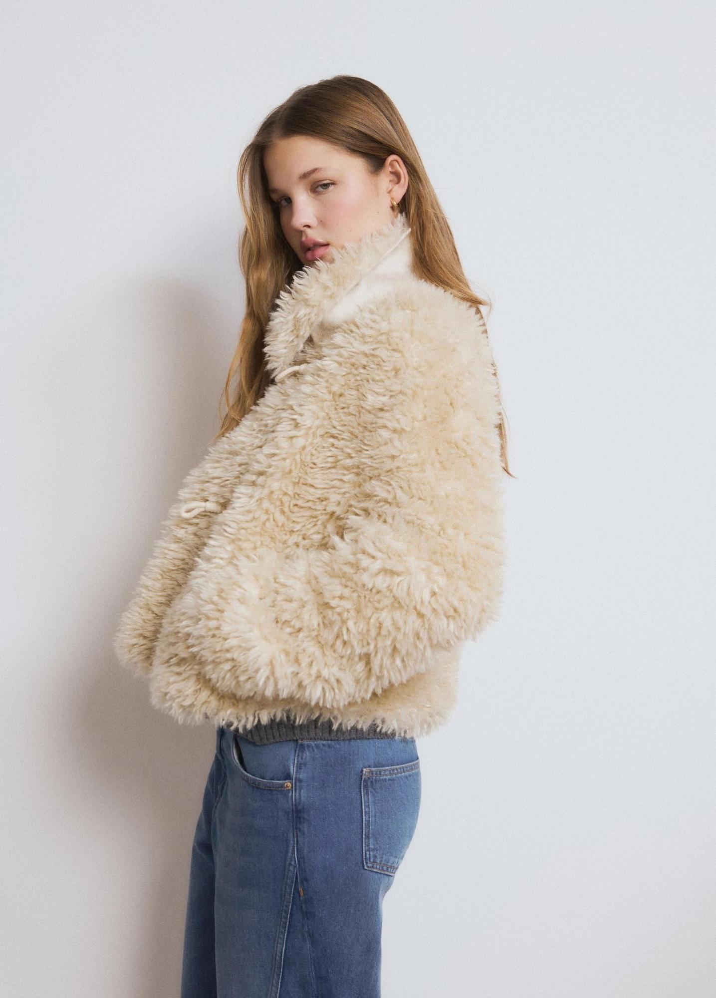 Manteau court effet fourrure