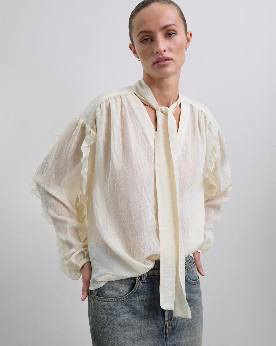 Blouse blanche à nœud