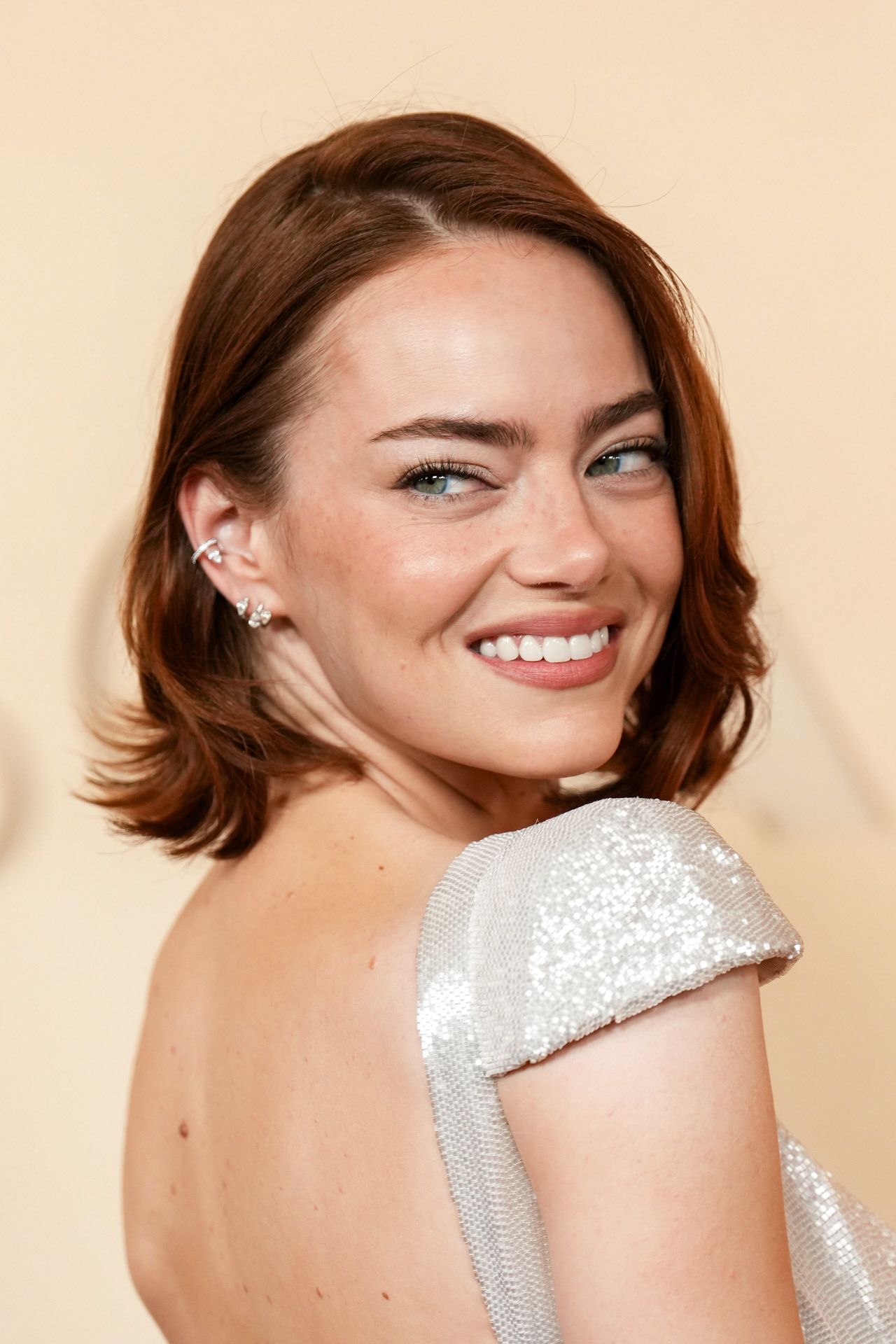 Emma Stone avec des lèvres nues aux Oscars 2026