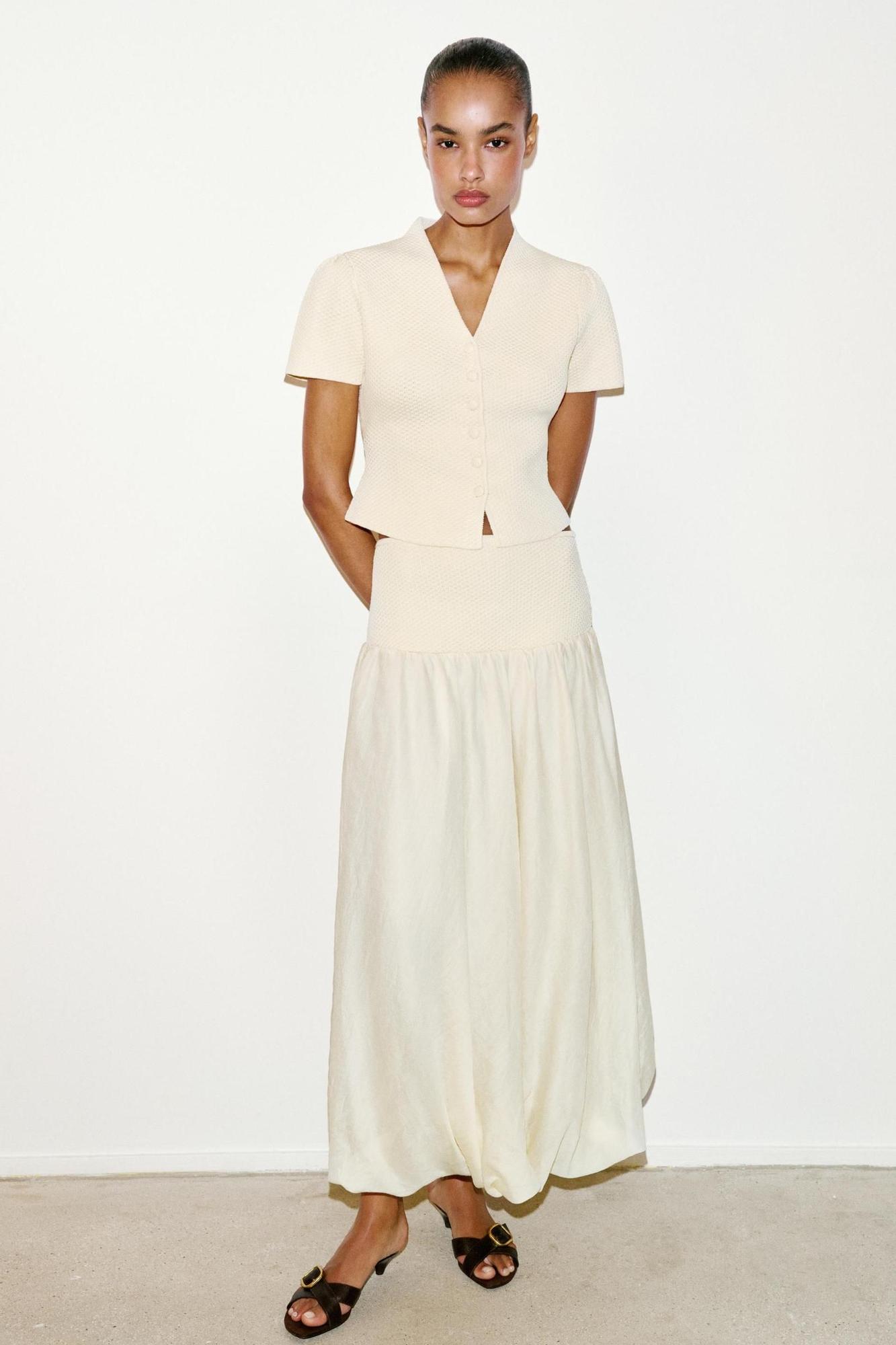 Ensemble veste en maille et jupe midi