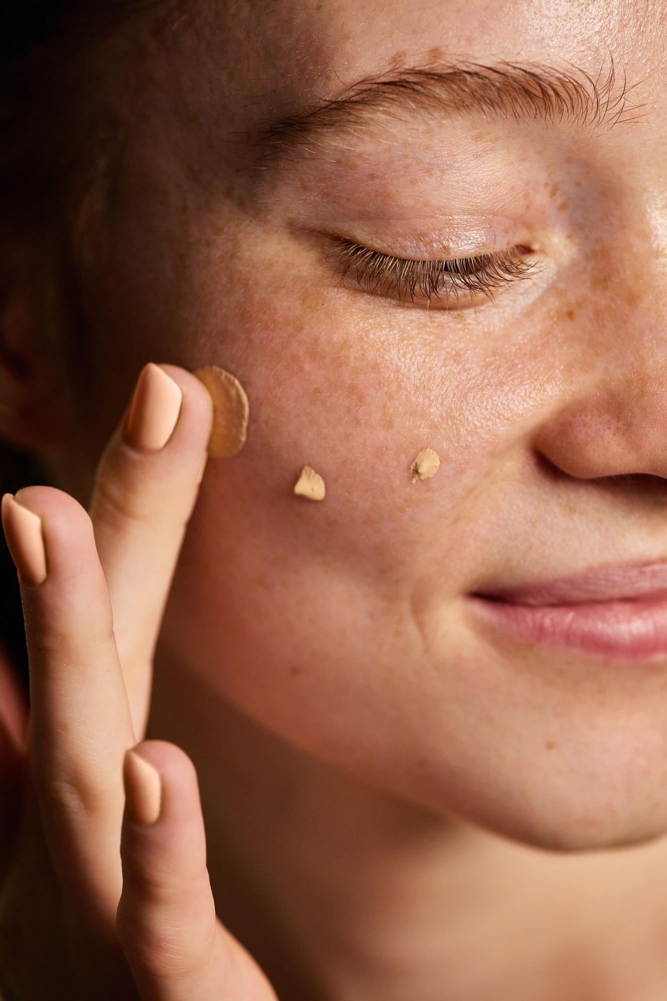 Crème solaire teintée