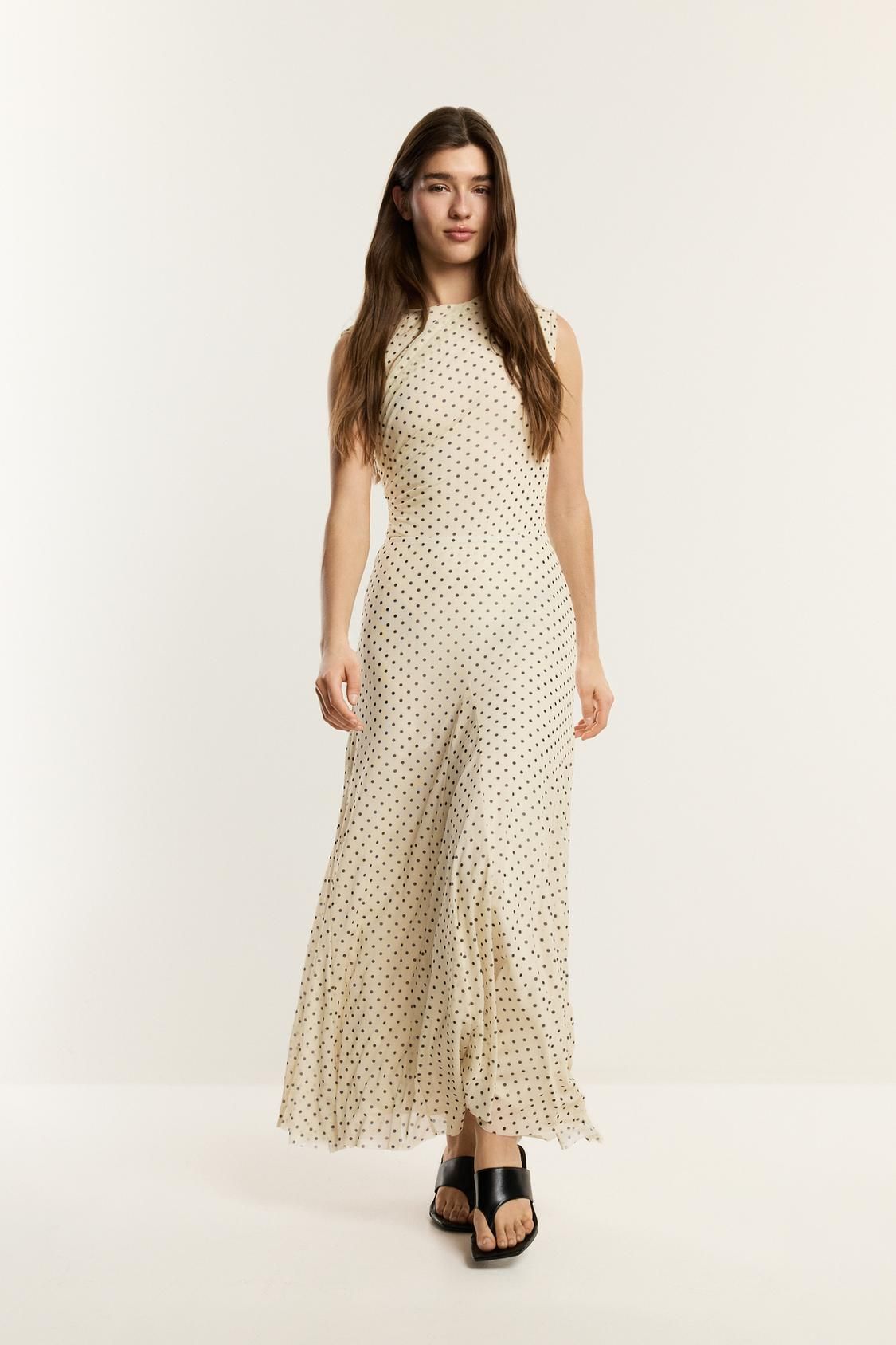Ensemble body à pois et jupe longue