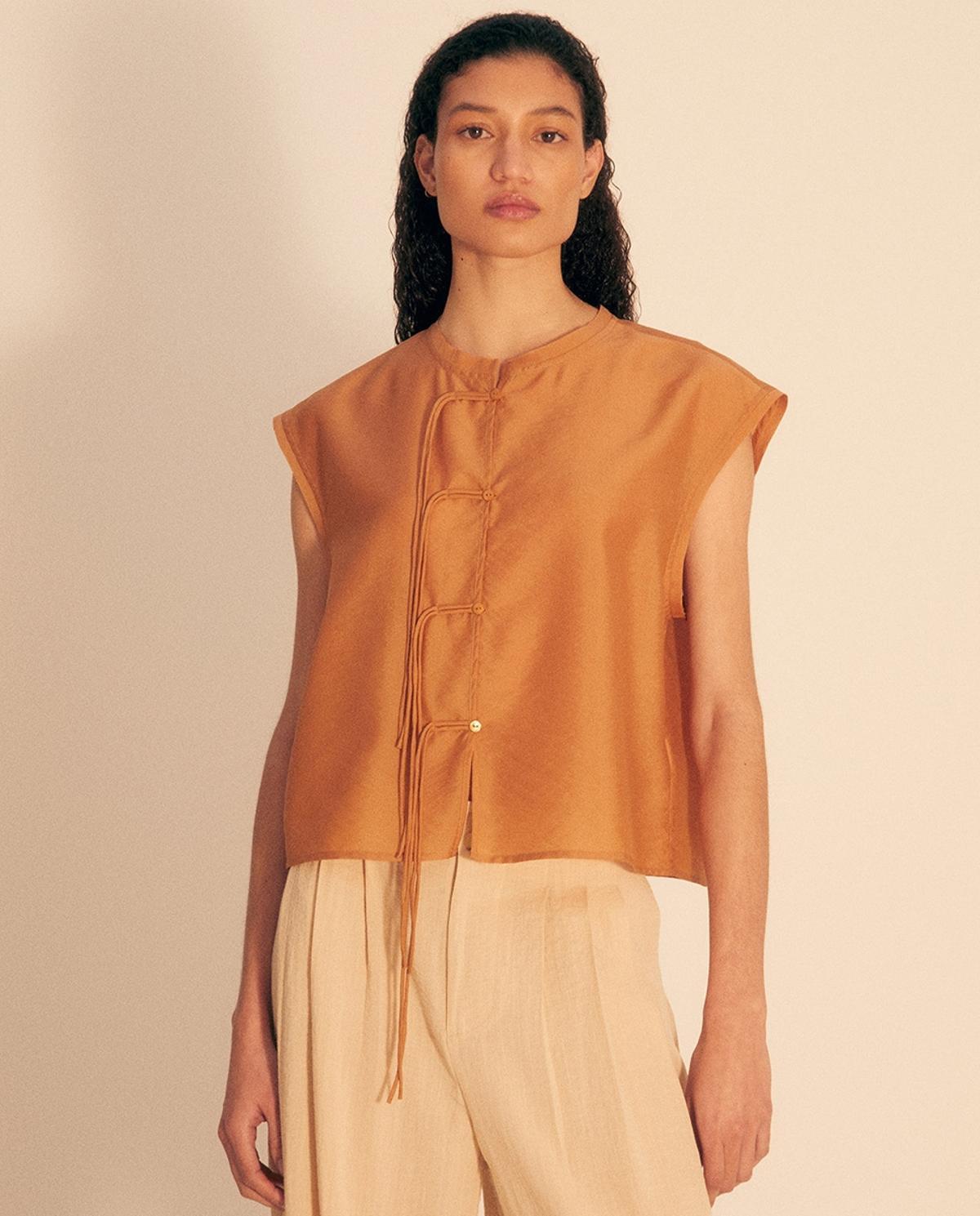 Blouse sans manches avec détails de fermeture