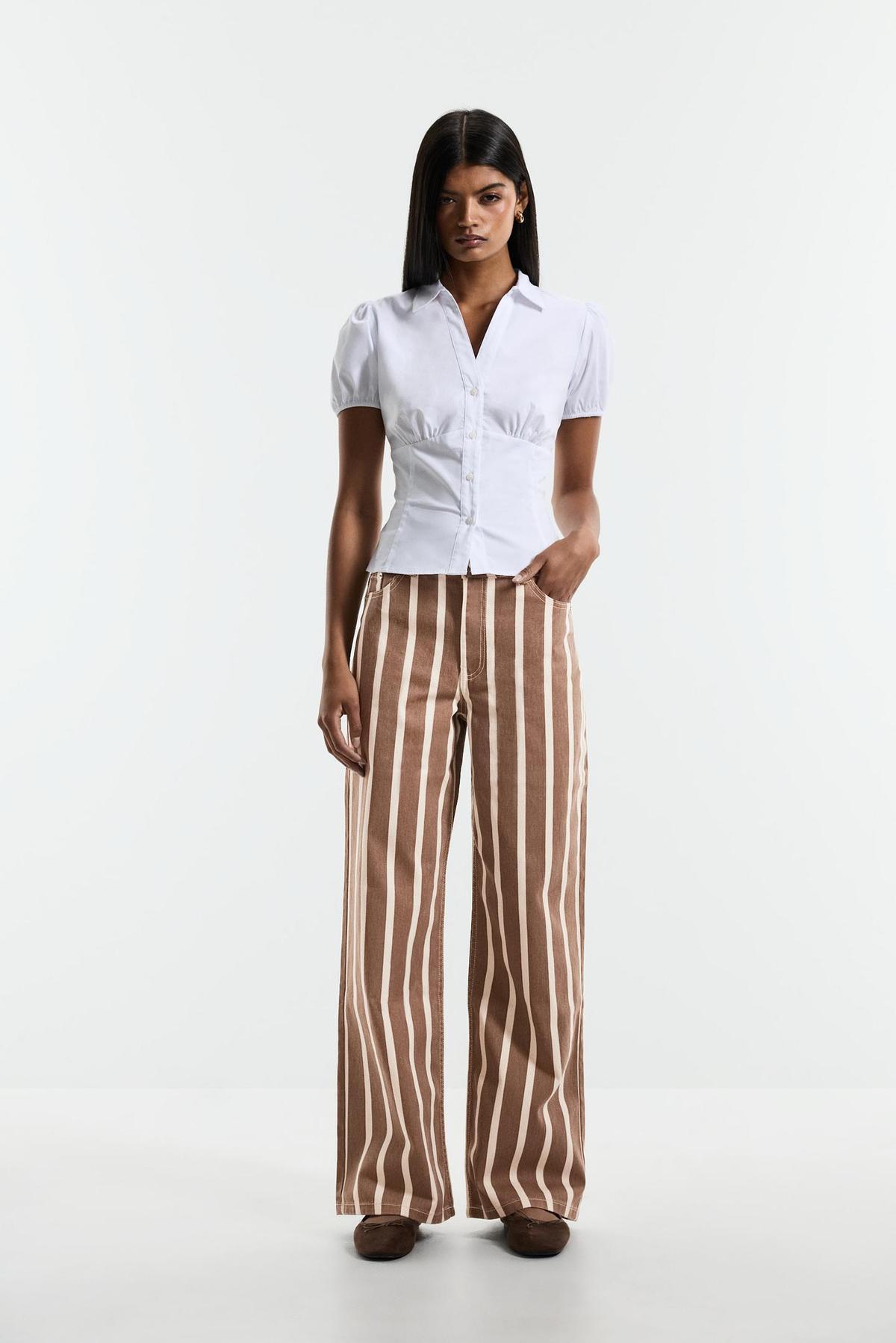 Pantalon rayé bicolore marron et blanc