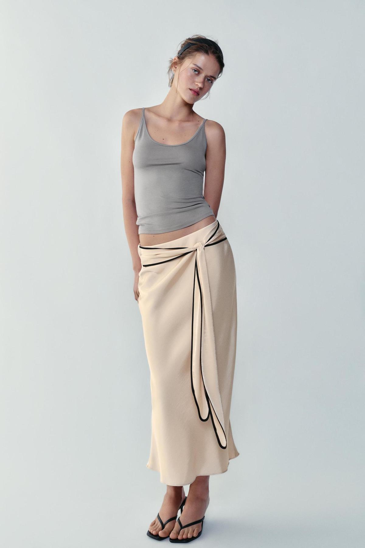 Jupe midi à nœud en satin