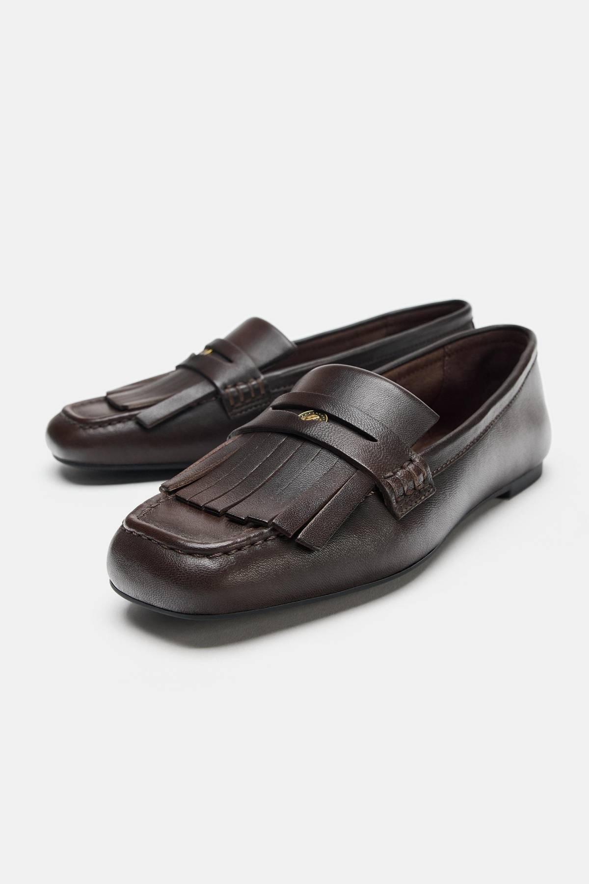 Mocassins en cuir à franges