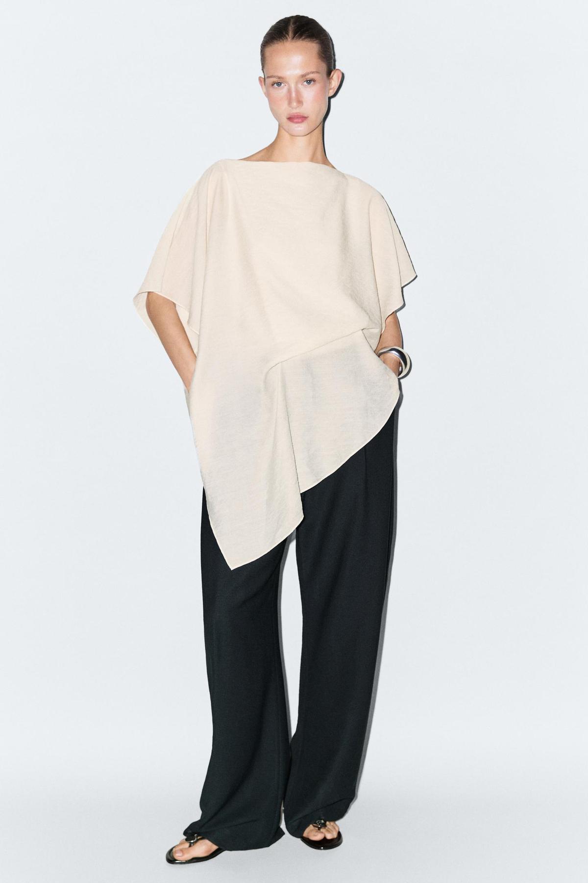 Blouse fluide type cape blanche