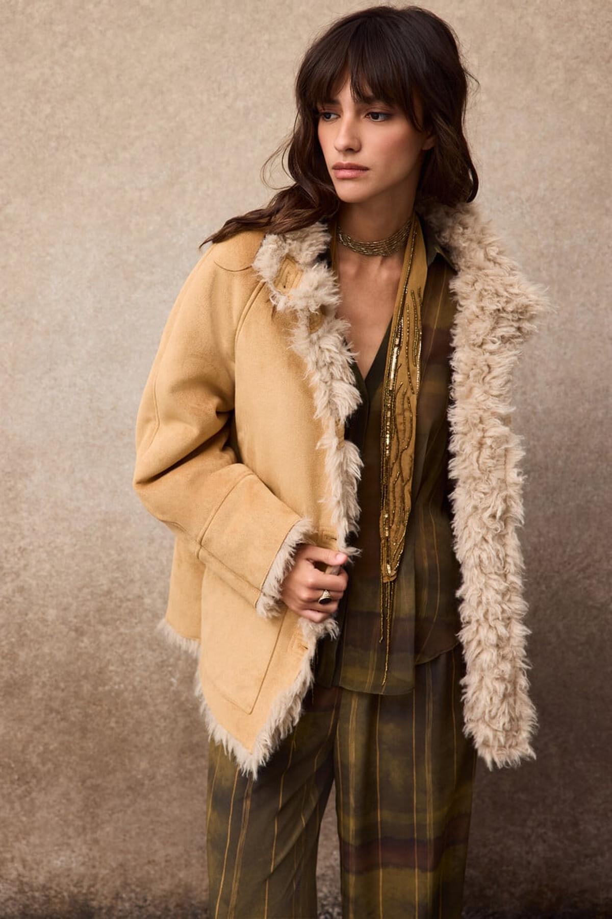 Manteau en fourrure marron double face